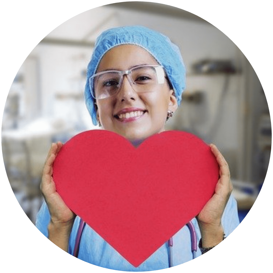 Sterile Processing Tech holding a heart. The heart of Spd 